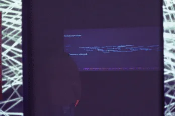 The same view, the visitor closer and blurred, a few words coming forward in the projection
