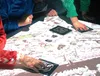 Children interacting with a projected surface under the Tableviewer